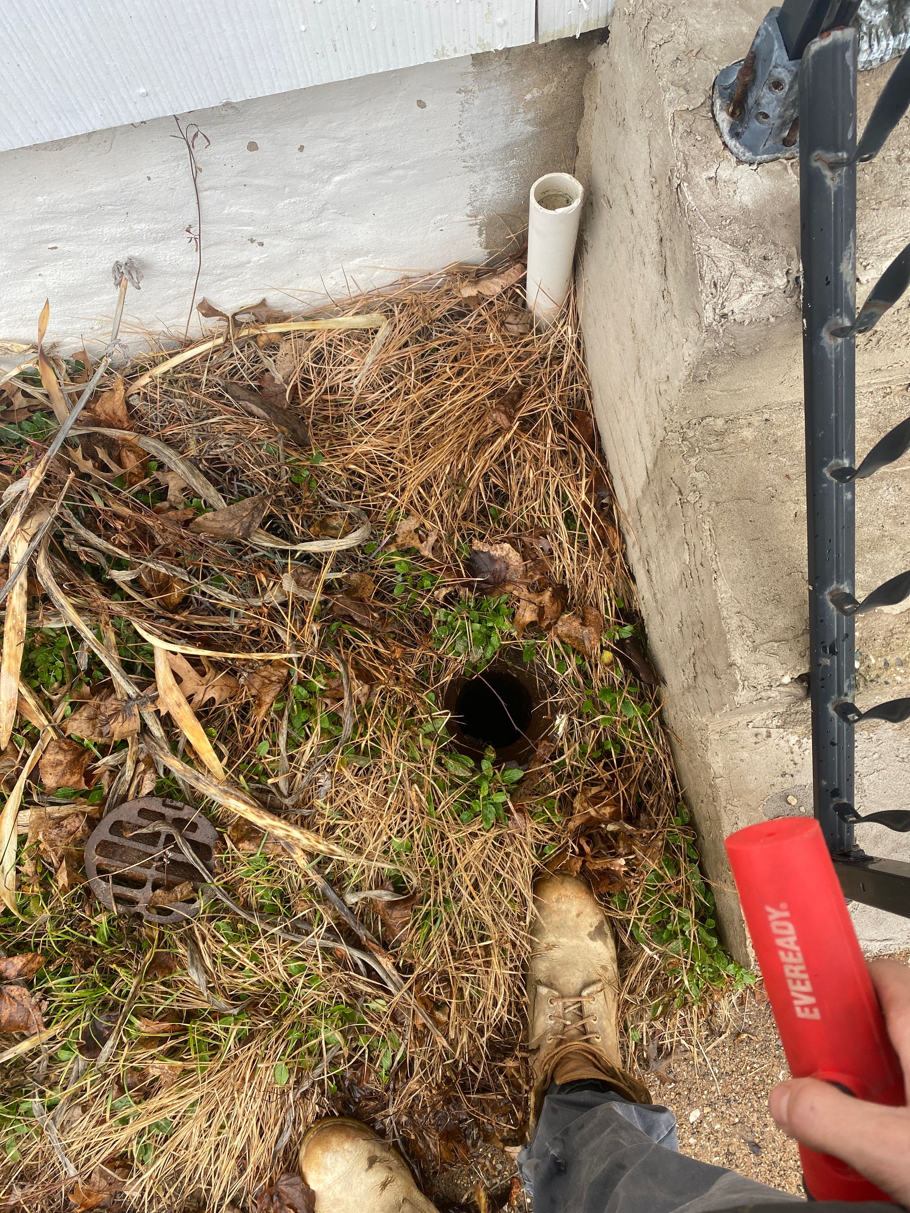 Technician operating sewer camera